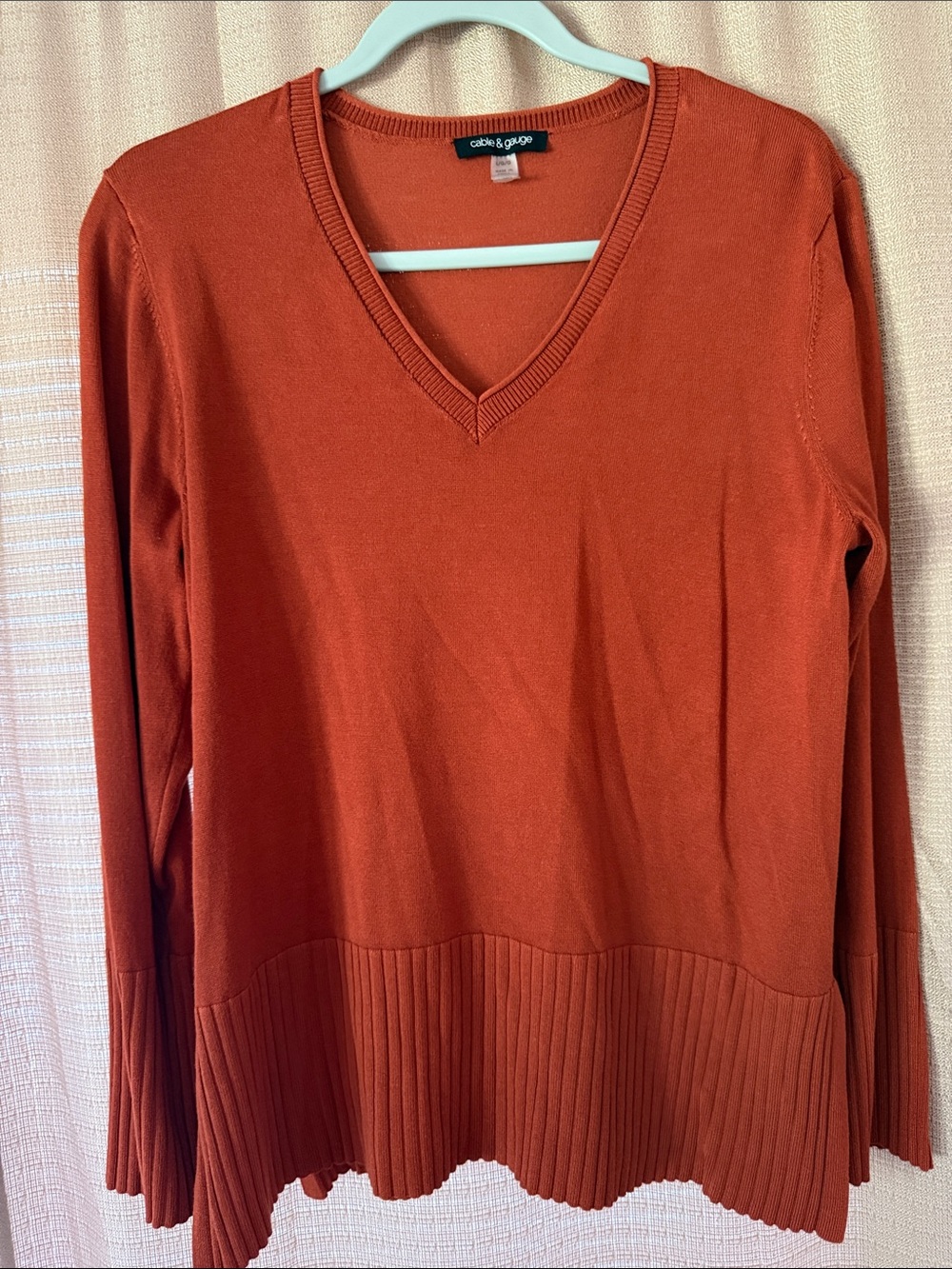 Cable & Gauge Women's V-Neck Sweater in Rust Orange